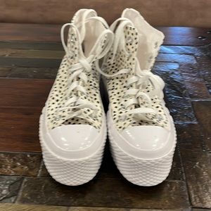 Chuck Taylor Converse all star high tops.  Black and white polkadot Size 6